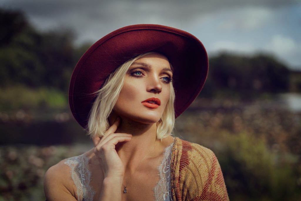 Portrait of a female model in a sun hat