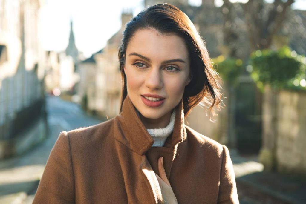 A portrait of a women lit using a reflector